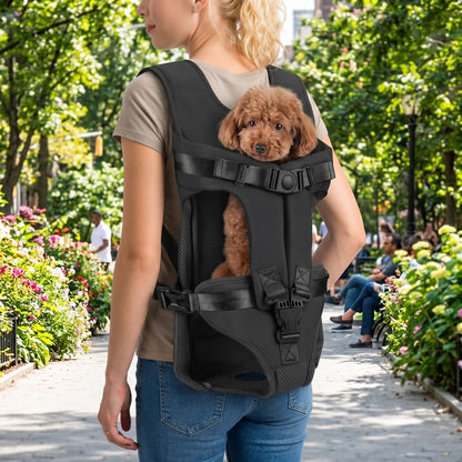 Full-body view of ergonomic dog backpack carrier with adjustable straps worn in park setting during daytime.