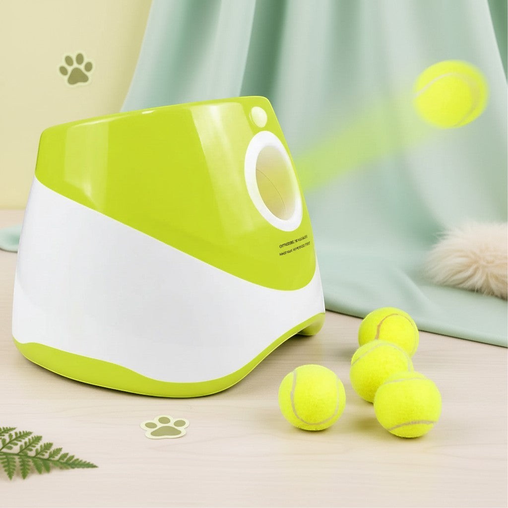 Milleo automatic dog ball launcher in white and lime green, with three tennis balls and one in motion.
