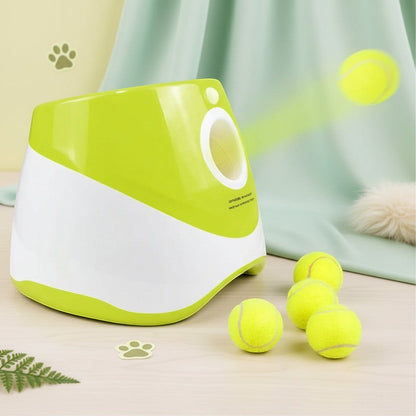 Milleo automatic dog ball launcher in white and lime green, with three tennis balls and one in motion.