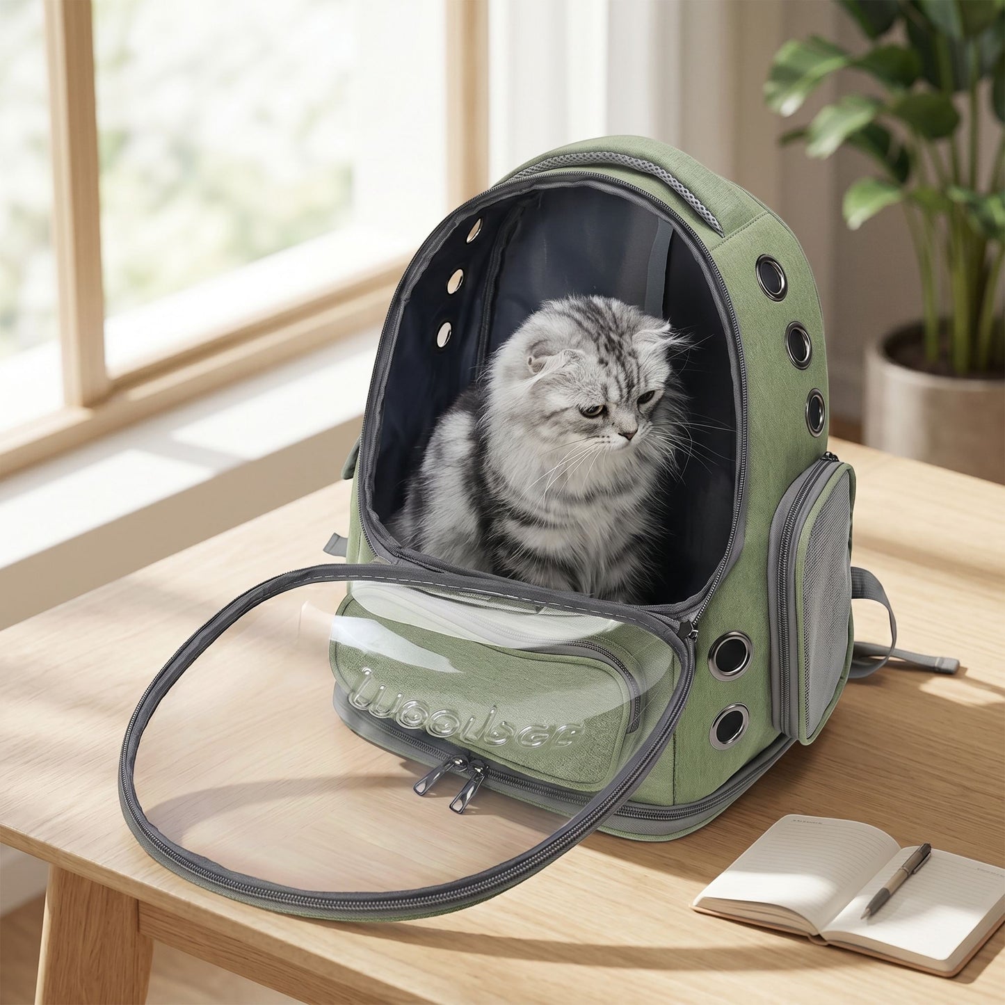 Overhead view of a small khaki nylon pet backpack on a white table, highlighting lightweight design and micro-textural details in bright natural light.